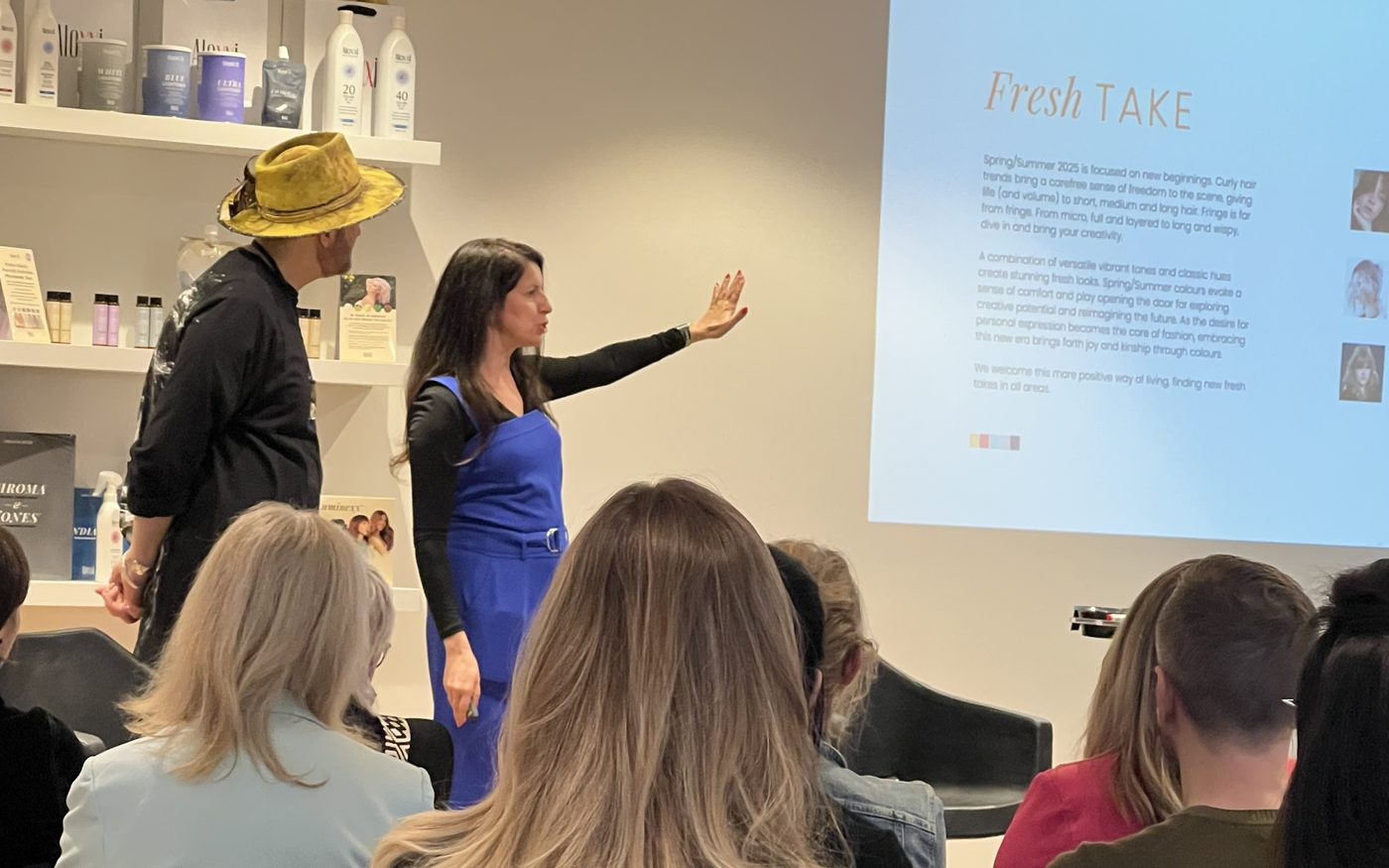 Jessica teaching a room of stylists